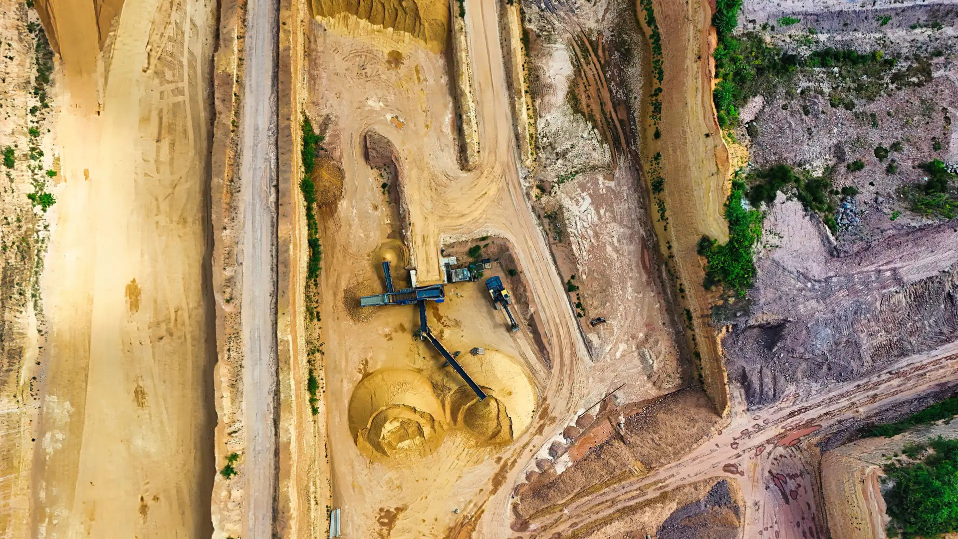 Open-pit mine slopes where deformation, environmental, and personnel monitoring share one safety workflow