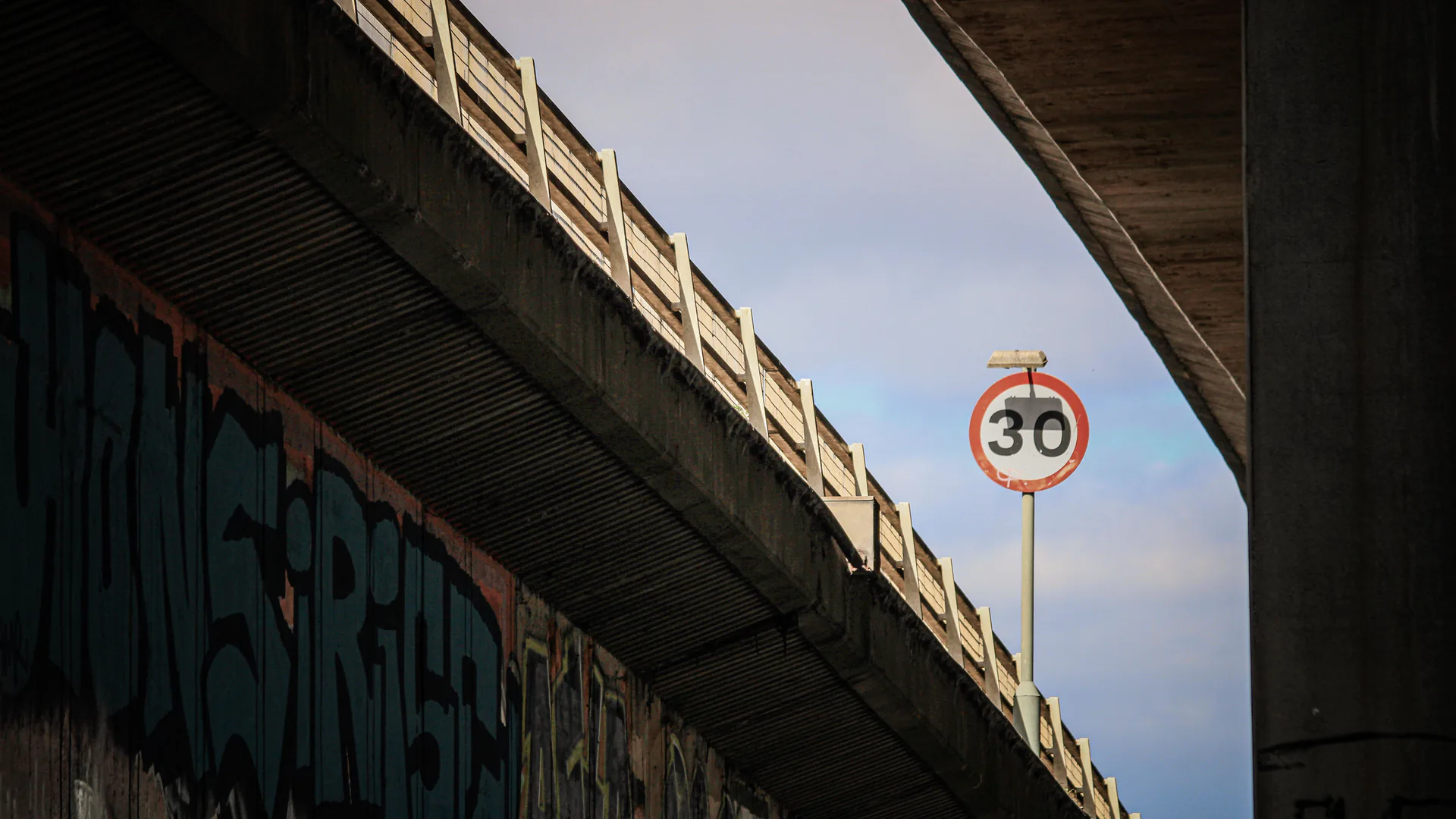Traffic passing a posted speed limit where an automated enforcement program must align measurement and public notice