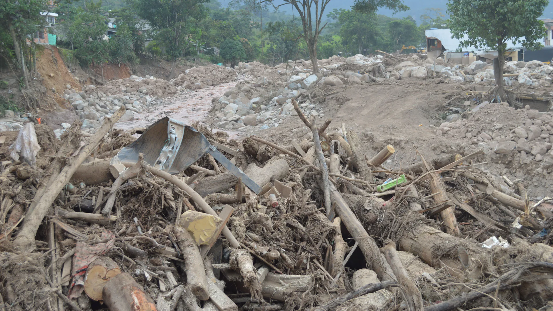 Mountain road affected by slope debris where monitoring must connect detection to a timely closure decision
