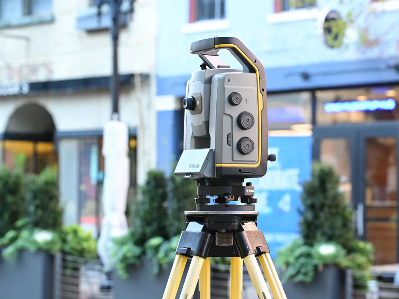 Survey instrument observing civil infrastructure where monument stability and reference control govern measurement confidence