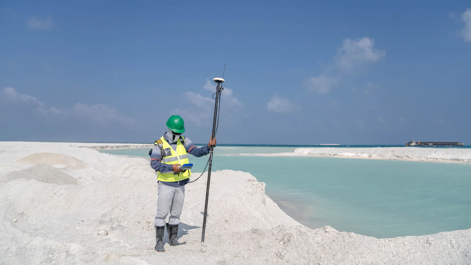 GNSS surveying receiver on a tripod establishing a repeatable reference for deformation measurements