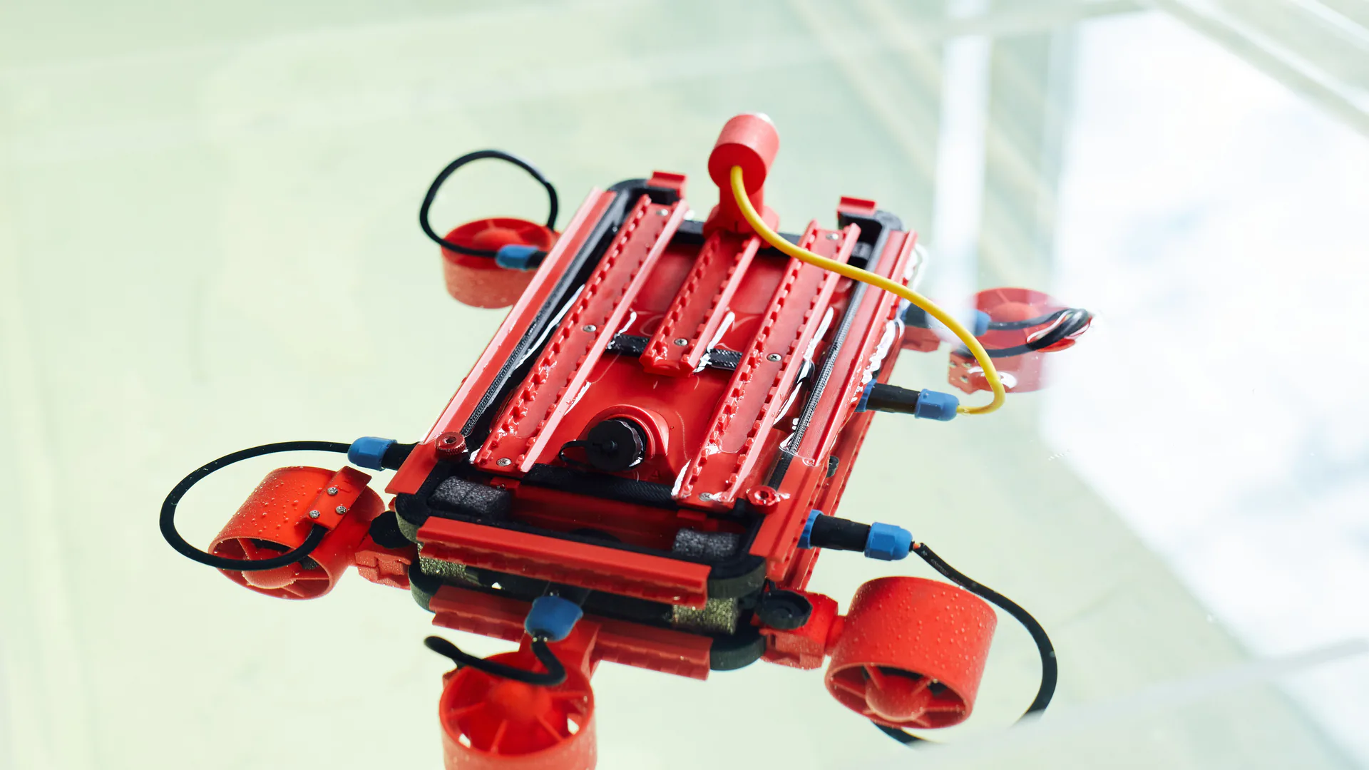 Industrial underwater ROV deployed for inspection as part of a complete vehicle tether and control system
